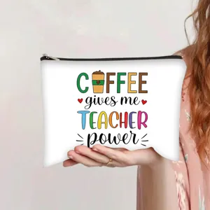 White canvas makeup bag with 'Coffee gives me Teacher power' print and zipper detail