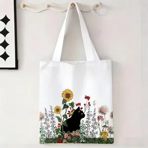 Detalle de bolsa de lona blanca con estampado de gato negro y jardín de girasoles