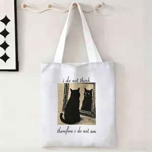 Vista detallada de la bolsa de lona blanca con estampado de gato negro y frase original