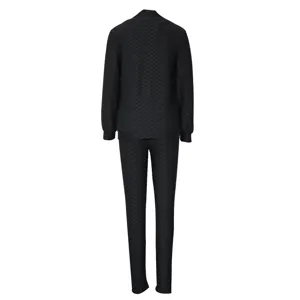 Women's black long sleeve jacket and pants activewear set, textured fabric detail view.