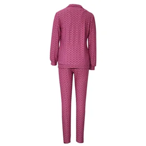 Women's honeycomb texture long sleeve jacket and pants sportswear set, rear view.