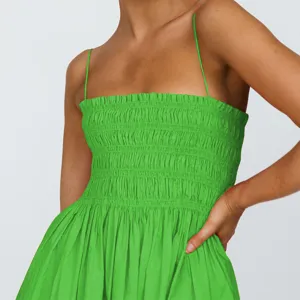 Green smocked spaghetti strap linen dress detail, elegant summer high waist casual slip midi dress.