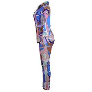 Side view of women's fashion casual blazer and pants two piece set with abstract geometric print.