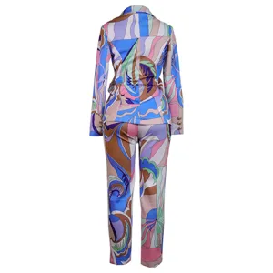 Women's abstract geometric print blazer and pants suit two piece casual trouser set.