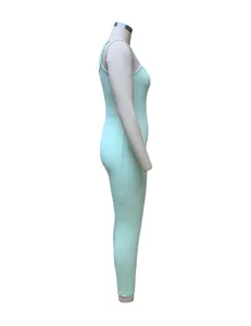 Detailed side view of the mint green ribbed camisole jumpsuit, showcasing slim fit stretch fabric.