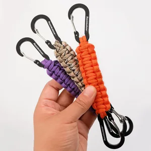 Detailed view of handmade paracord keychain with sturdy metal carabiner in multiple vibrant colors.