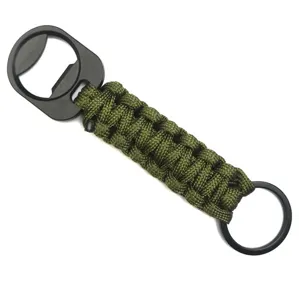 Outdoor survival paracord keychain with metal bottle opener and black keyring for hiking use.