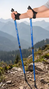 Detail view of adjustable aluminum alloy trekking poles for outdoor hiking and walking.