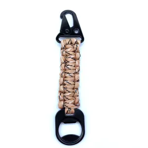Outdoor paracord keychain with durable metal eagle clip and integrated bottle opener detail view.