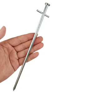 Zinc alloy cross tent peg for outdoor camping canopy setup, durable metal ground anchor stake.