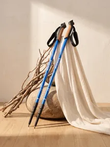 Adjustable aluminum trekking poles for outdoor hiking, lightweight walking sticks with cork grips.
