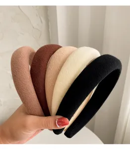 Detailed view of five neutral padded headbands showing high-quality texture and color variety.