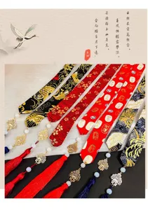 Detail of traditional Chinese style hair ribbons with tassels and intricate patterns