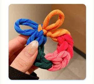 Close-up of a colorful braided hair tie with high elasticity and vibrant knit texture