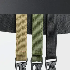 Close-up detail of outdoor tactical webbing straps with sturdy eagle-mouth metal buckles.