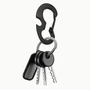 Black EDC multi-functional carabiner keychain with bottle opener and keys detail shot.