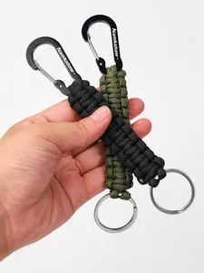 Detailed view of handmade paracord keychain with sturdy metal carabiner and keyring.