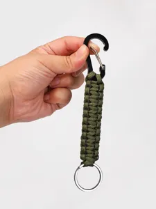 Close-up detail of the tactical paracord keychain showcasing the sturdy weave and hook.