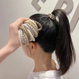 Close-up of durable braided high-elasticity hair ties used for a secure high ponytail