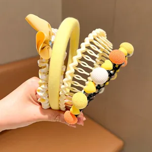 A variety of cute yellow hair accessories for girls, including headbands and clips