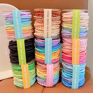 Colorful elastic hair tie spools with 'Worry Less Smile More' text for girls