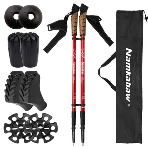 Set di bastoncini da trekking regolabili in alluminio con manici in sughero e borsa per escursioni.