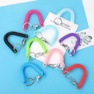 Set di portachiavi a spirale colorati e cordini elastici estensibili pratici per uso quotidiano.