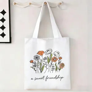 Bolso de lona blanca con estampado floral y cita a sweet friendship detalle de diseño suave