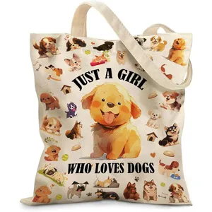 Primer plano de bolsa de lona con adorables ilustraciones de perros y texto impreso