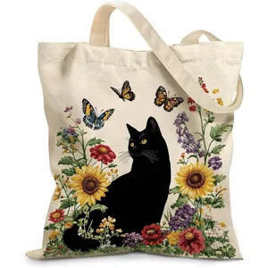 Vista detallada de la bolsa de lona con estampado artístico de gato negro y girasoles
