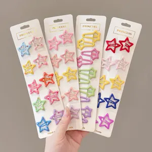 Detailed view of colorful star-shaped hair clips on princess-themed cardboards