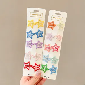 Close-up view of various colorful star-shaped hair clips on white display cards