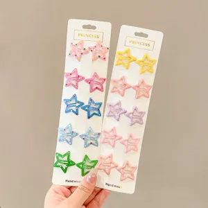 Macro detail of colorful star-shaped hair clips for girls in various pastel shades