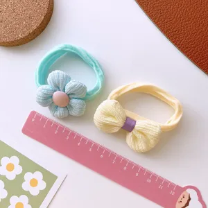 Cintas para el pelo de tela en tonos pastel con bonitos diseños de flores y lazos para niñas.