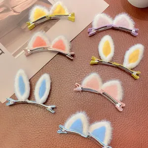 Assorted cute plush rabbit and cat ear hair clips for girls in various pastel colors