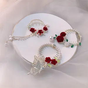 Elegant rose and butterfly hair clips with pearls for bun styling and half-up hair