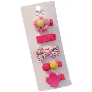 Set of 5 cute pink and yellow fabric wrapped hair clips for baby girls on white card