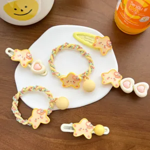 Cute yellow star-shaped hair clips and elastic hair ties set for girls