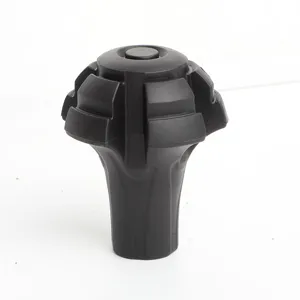 Black rubber trekking pole tip protector detail view, durable hiking stick foot cover