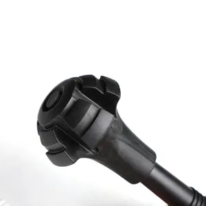 Rubber trekking pole tip protector detail, black torpedo anti-slip walking stick foot cover.
