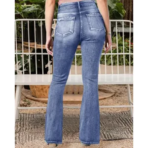 Back view detail of mid-waist washed blue flared jeans, retro style denim pants for women.