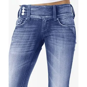 Close-up detail of women's retro side button mid-waist flared denim jeans pocket and waist.