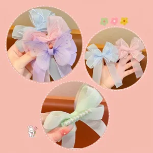 Set de elegantes pinzas para el cabello de mariposa de organza para niñas en rosa y azul
