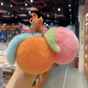 Cute and soft real rabbit fur pom pom keychains in colorful fruit shapes for bags