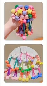 Close-up detail shot of colorful beaded elastic hair ties for kids on white display cards