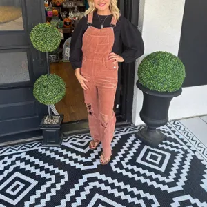 Women's corduroy jumpsuit fall winter casual overalls with pockets and distressed ripped details.