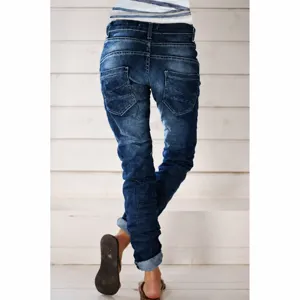 Women's dark blue washed denim jeans slim fit casual long trousers with back pockets.