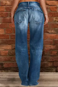 Detailed view of women denim jeans, classic blue washed straight leg style in scene.