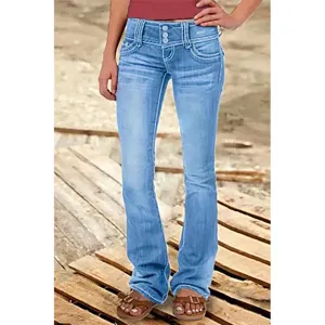 Detailed view of women light blue low rise flared denim jeans with multiple buttons.