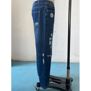 Women's ripped denim straight leg trousers, stylish casual mid-waist blue jeans for daily use.